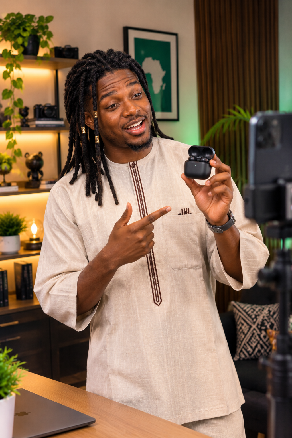Creator reviewing a gadget in a warm studio